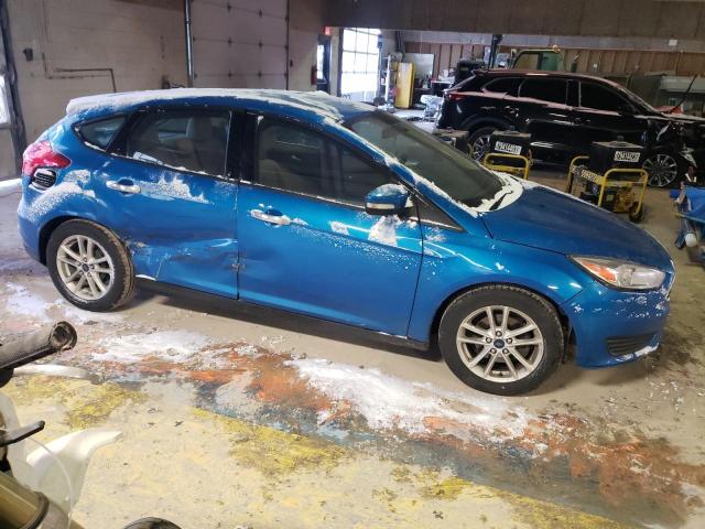 1FADP3K24FL302627 - 2015 FORD FOCUS SE BLUE photo 4