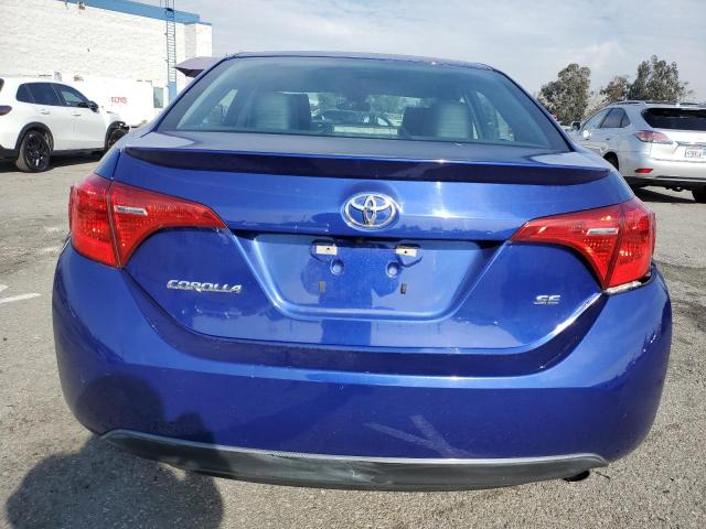 5YFBURHEXHP637304 - 2017 TOYOTA COROLLA L BLUE photo 6