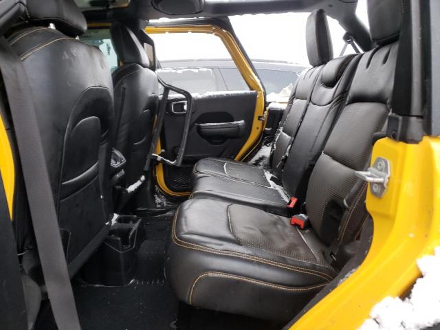 1C4HJXDG2JW281197 - 2018 JEEP WRANGLER U SPORT Gelb Foto 10