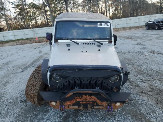 1J4FA54189L754390 - 2009 JEEP WRANGLER SAHARA SILVER photo 5