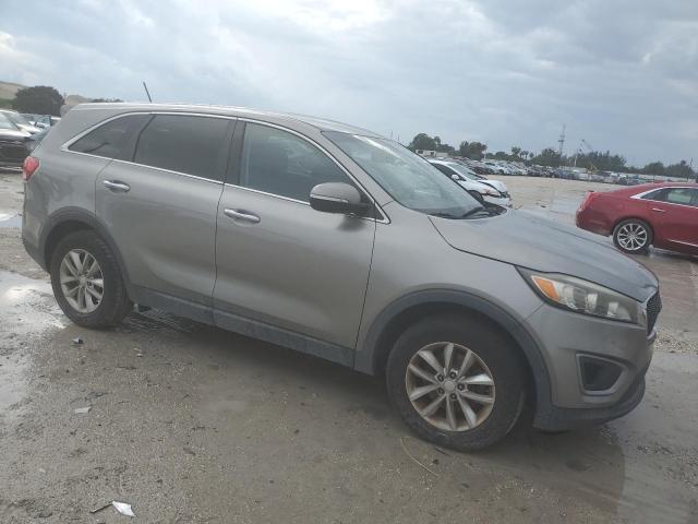 5XYPG4A3XGG084178 - 2016 KIA SORENTO LX SILVER photo 4