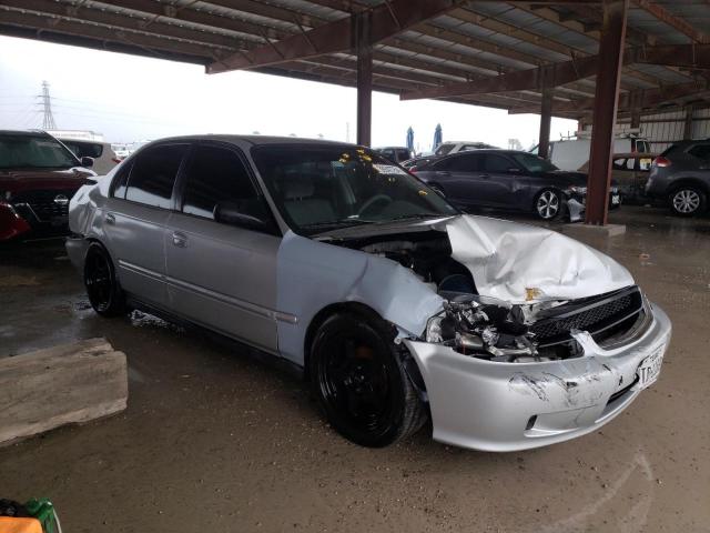 2HGEJ6617YH534630 - 2000 HONDA CIVIC BASE SILVER photo 4