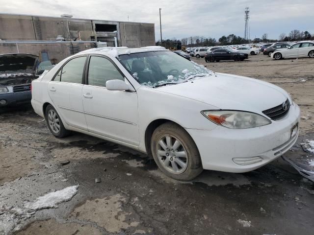 JTDBF30K520003201 - 2002 TOYOTA CAMRY LE WHITE photo 4