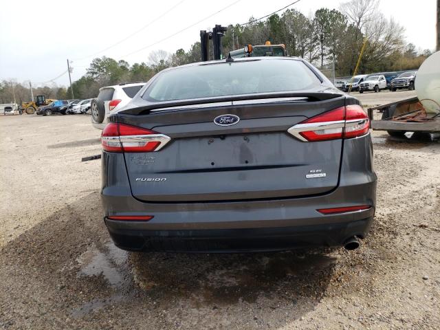 3FA6P0HDXKR127585 - 2019 FORD FUSION SE GRAY photo 6