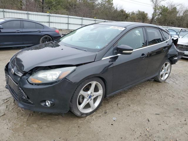 1FAHP3N23CL360740 - 2012 FORD FOCUS TITANIUM BLACK photo 1