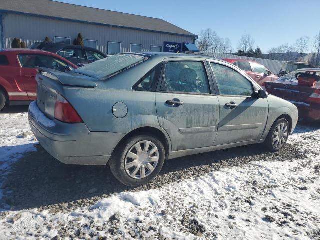 1FAHP34N96W106853 - 2006 FORD FOCUS ZX4 GRAY photo 3