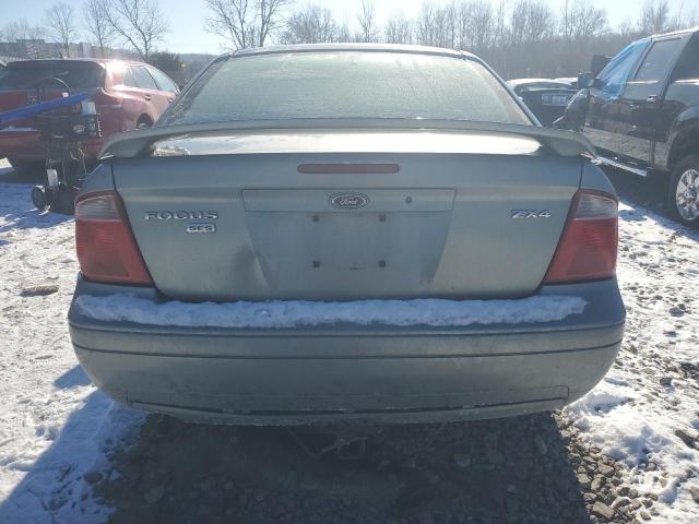 1FAHP34N96W106853 - 2006 FORD FOCUS ZX4 GRAY photo 6