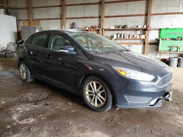 1FADP3F21JL210085 - 2018 FORD FOCUS SE BLACK photo 4