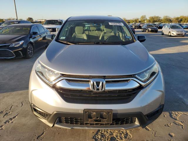 2HKRW6H33KH219564 - 2019 HONDA CR-V LX SILVER photo 5