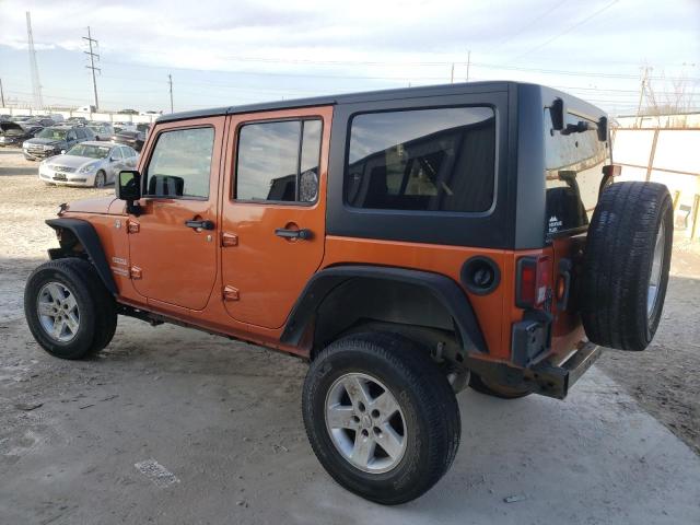1J4BA3H15BL515818 - 2011 JEEP WRANGLER U SPORT Помаранчевий фото 2
