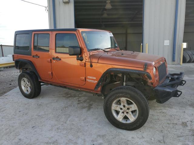 1J4BA3H15BL515818 - 2011 JEEP WRANGLER U SPORT Помаранчевий фото 4