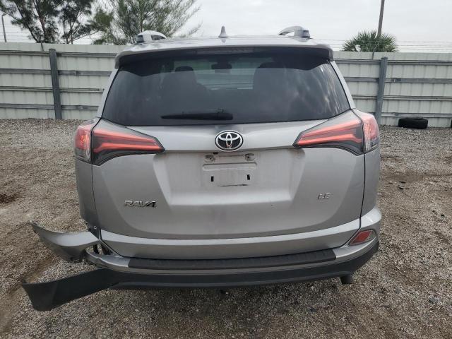 2T3ZFREV9HW362317 - 2017 TOYOTA RAV4 LE SILVER photo 6