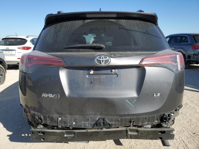 JTMZFREV8JJ731785 - 2018 TOYOTA RAV4 LE GRAY photo 6