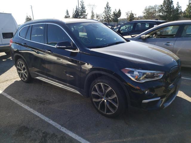 WBXHU7C39H5H35604 - 2017 BMW X1 SDRIVE28I BLACK photo 4
