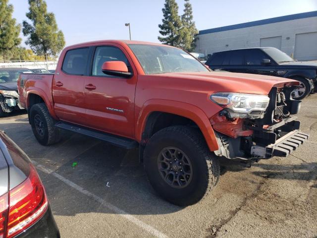 3TMAZ5CN7JM076702 - 2018 TOYOTA TACOMA DOUBLE CAB ORANGE photo 4