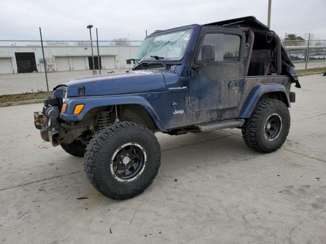 1J4FA29PXYP801146 - 2000 JEEP WRANGLER / SE BLUE photo 1