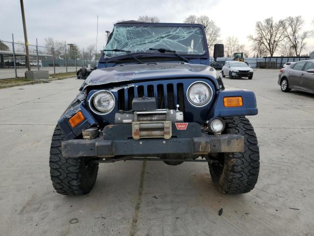 1J4FA29PXYP801146 - 2000 JEEP WRANGLER / SE BLUE photo 5