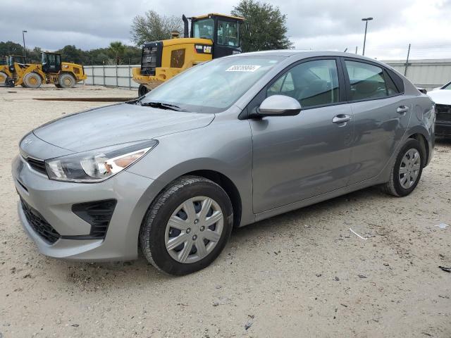 3KPA24AD7PE564236 - 2023 KIA RIO LX GRAY photo 1