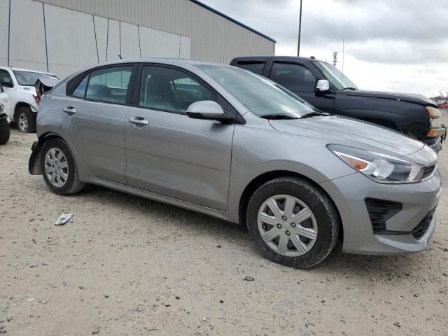 3KPA24AD7PE564236 - 2023 KIA RIO LX GRAY photo 4