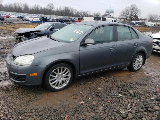 3VWRJ71K69M034819 - 2009 VOLKSWAGEN JETTA WOLFSBURG GRAY photo 1