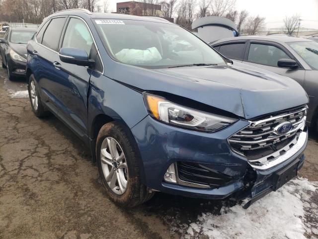 2FMPK4J93KBB33703 - 2019 FORD EDGE SEL BLUE photo 4