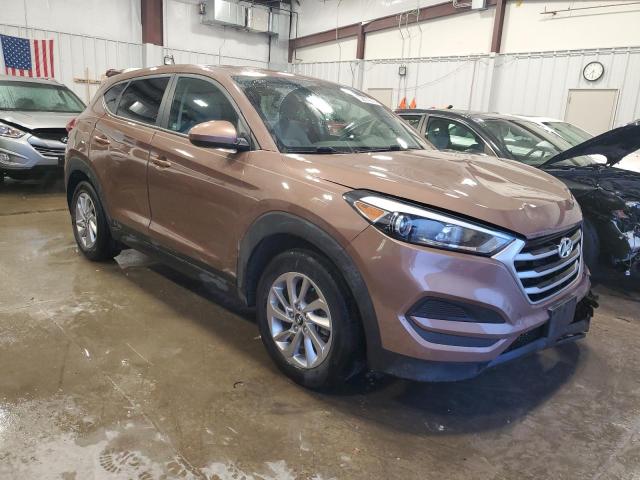 KM8J23A45HU399716 - 2017 HYUNDAI TUCSON SE BROWN photo 4