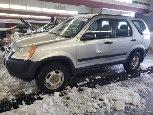 JHLRD78434C041726 - 2004 HONDA CR-V LX SILVER photo 1