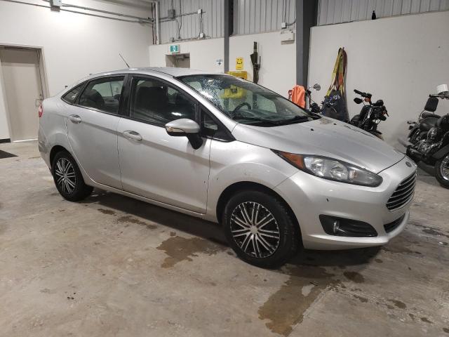 3FADP4BJXEM223876 - 2014 FORD FIESTA SE SILVER photo 4