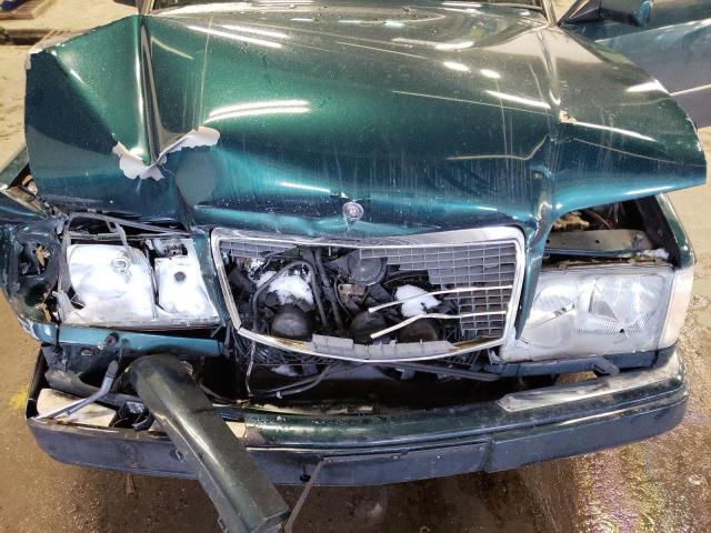 WDBEB31E0SC251712 - 1995 MERCEDES-BENZ E 300D GREEN photo 11