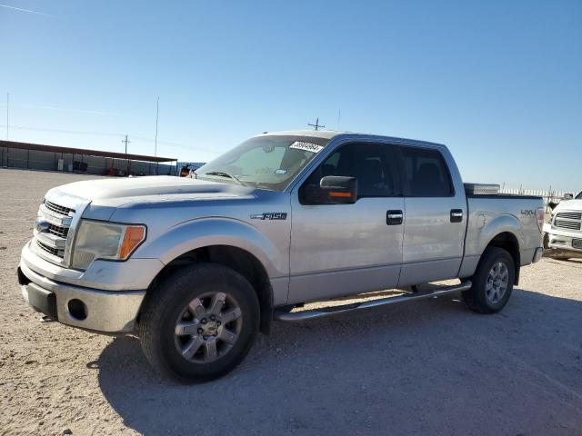 1FTFW1EF6EFC74304 - 2014 FORD F150 SUPERCREW SILVER photo 1