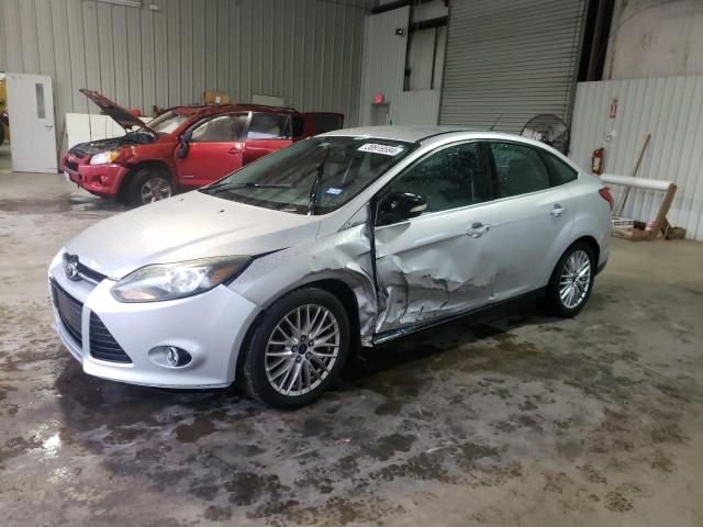 1FADP3J2XEL278799 - 2014 FORD FOCUS TITANIUM SILVER photo 1