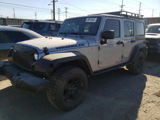 1C4BJWDG3GL121551 - 2016 JEEP WRANGLER U SPORT Silber Foto 1