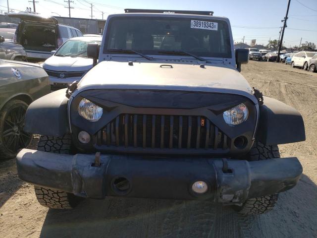 1C4BJWDG3GL121551 - 2016 JEEP WRANGLER U SPORT Silber Foto 5