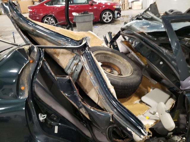 1Y1SK5284XZ402849 - 1999 CHEVROLET GEO PRIZM BASE GREEN photo 10