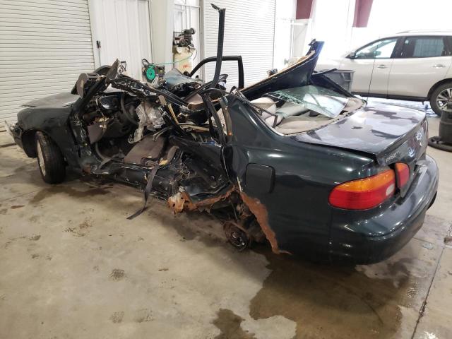 1Y1SK5284XZ402849 - 1999 CHEVROLET GEO PRIZM BASE GREEN photo 2