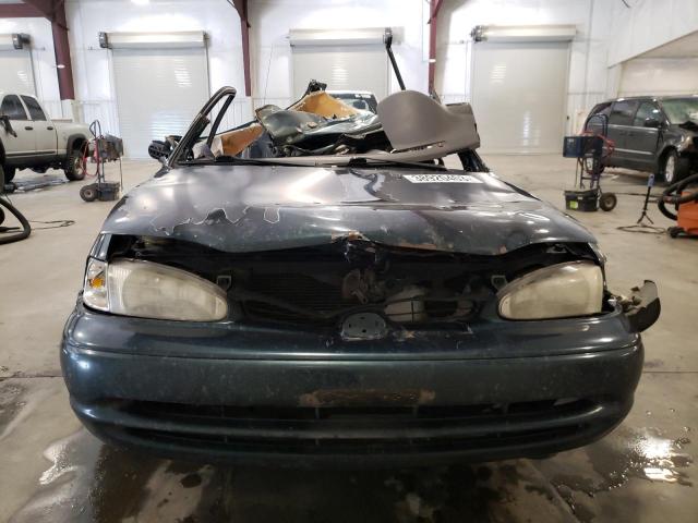 1Y1SK5284XZ402849 - 1999 CHEVROLET GEO PRIZM BASE GREEN photo 5