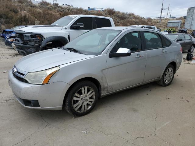 1FAHP3HN8AW269979 - 2010 FORD FOCUS SEL SILVER photo 1