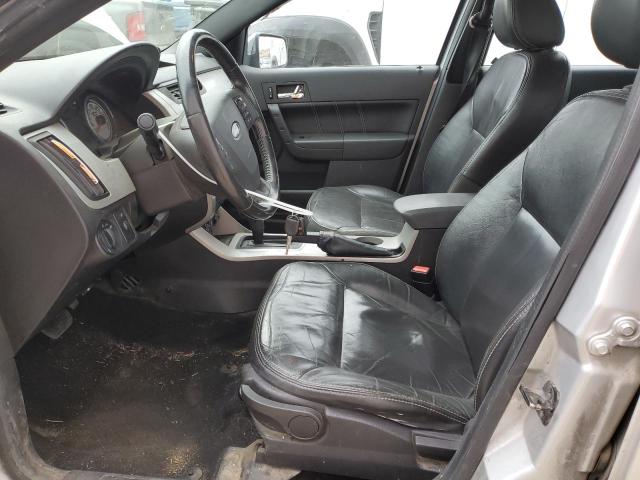 1FAHP3HN8AW269979 - 2010 FORD FOCUS SEL SILVER photo 7