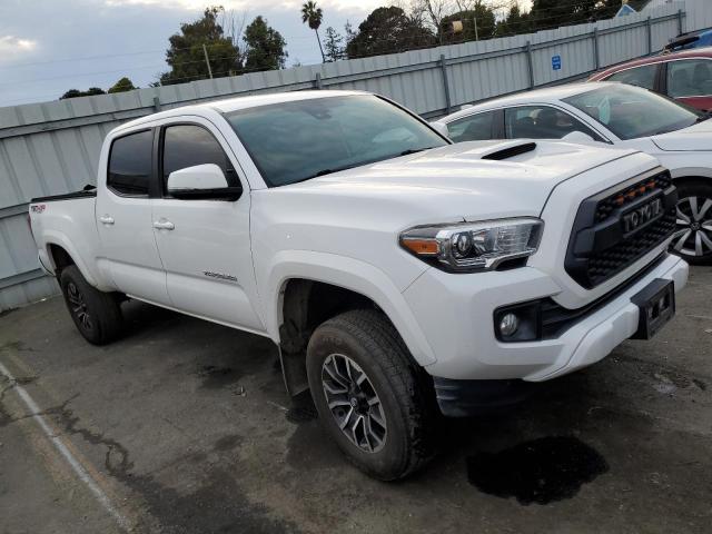 3TMDZ5BNXKM058999 - 2019 TOYOTA TACOMA DOUBLE CAB WHITE photo 4