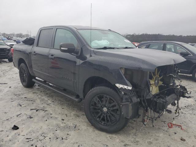 1N6AA1E51KN533991 - 2019 NISSAN TITAN SV BLACK photo 4