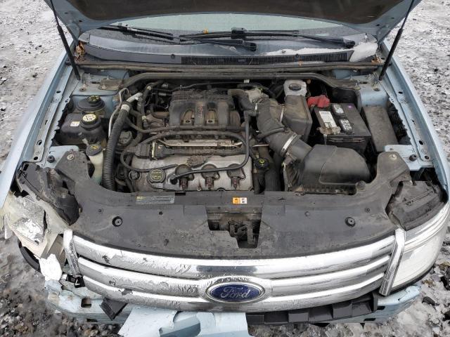 1FAHP24W98G137360 - 2008 FORD TAURUS SEL BLUE photo 11