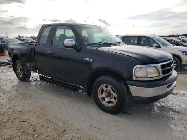 1FTDX07W5VKA53246 - 1997 FORD F150 BLACK photo 4