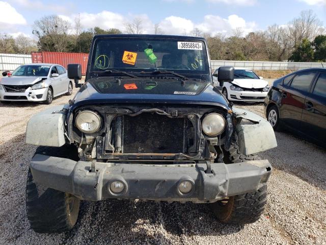 1J4HA3H15BL504408 - 2011 JEEP WRANGLER U SPORT შავი ფოტო 5