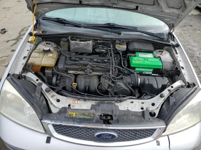 1FAFP34N75W181721 - 2005 FORD FOCUS ZX4 SILVER photo 11