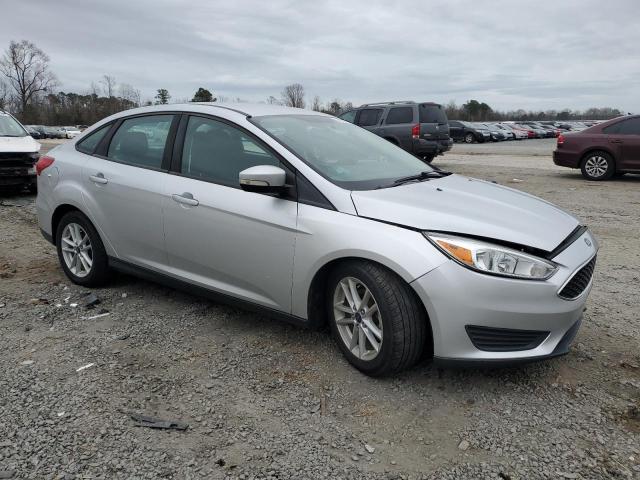 1FADP3F20HL322306 - 2017 FORD FOCUS SE SILVER photo 4