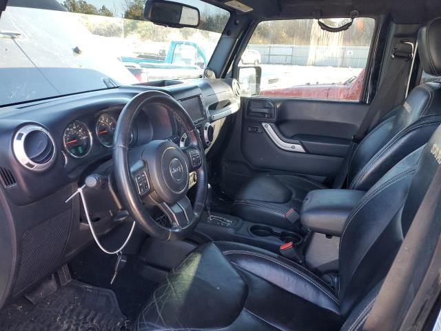 1C4BJWEG7EL258102 - 2014 JEEP WRANGLER U SAHARA BLACK photo 7