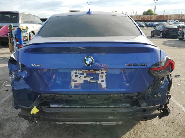 3MW53CM01N8C60748 - 2022 BMW M240XI BLUE photo 6