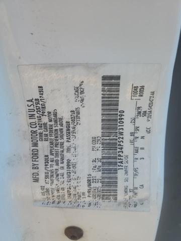 1FAFP34P52W310990 - 2002 FORD FOCUS SE WHITE photo 12