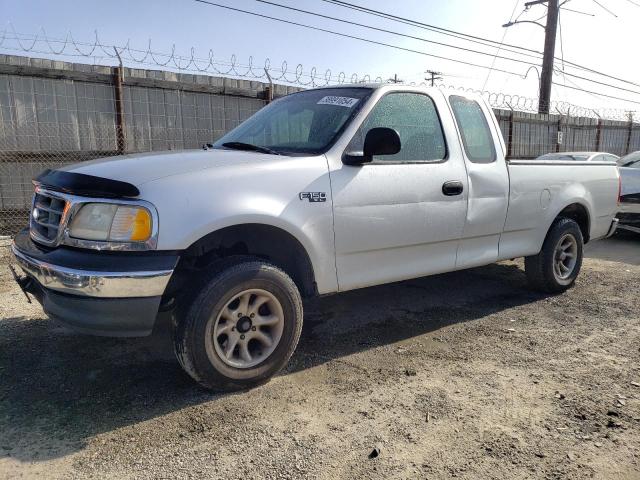 1FTZX1723YKA44333 - 2000 FORD F150 SILVER photo 1