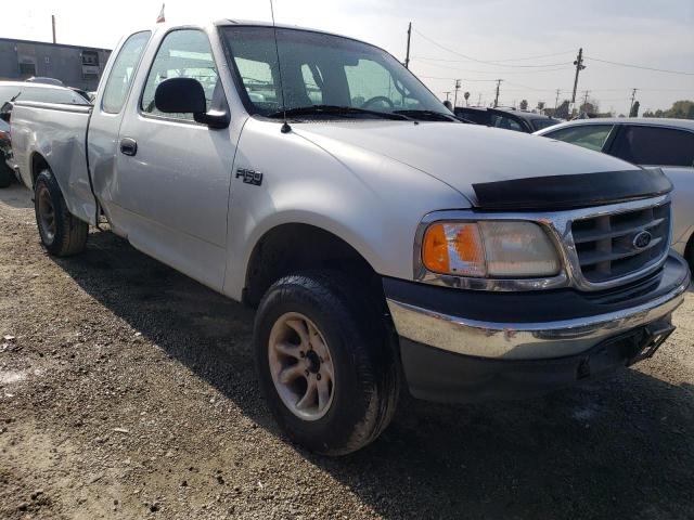 1FTZX1723YKA44333 - 2000 FORD F150 SILVER photo 4